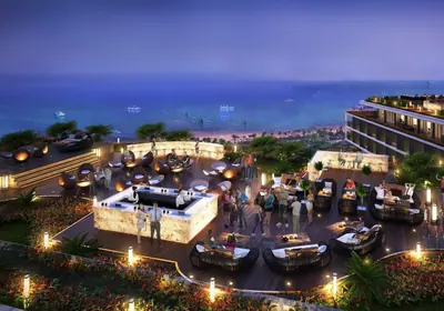Rooftop terrace overlooking the sea in Da Nang at dusk.